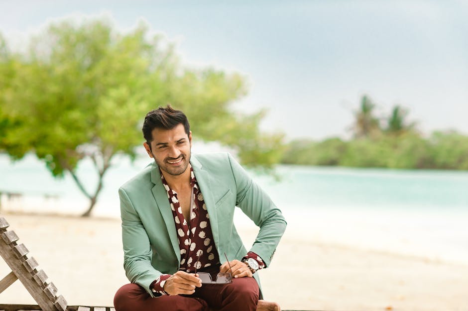 A fashionable man enjoying a tropical vacation on a pristine Maldivian beach